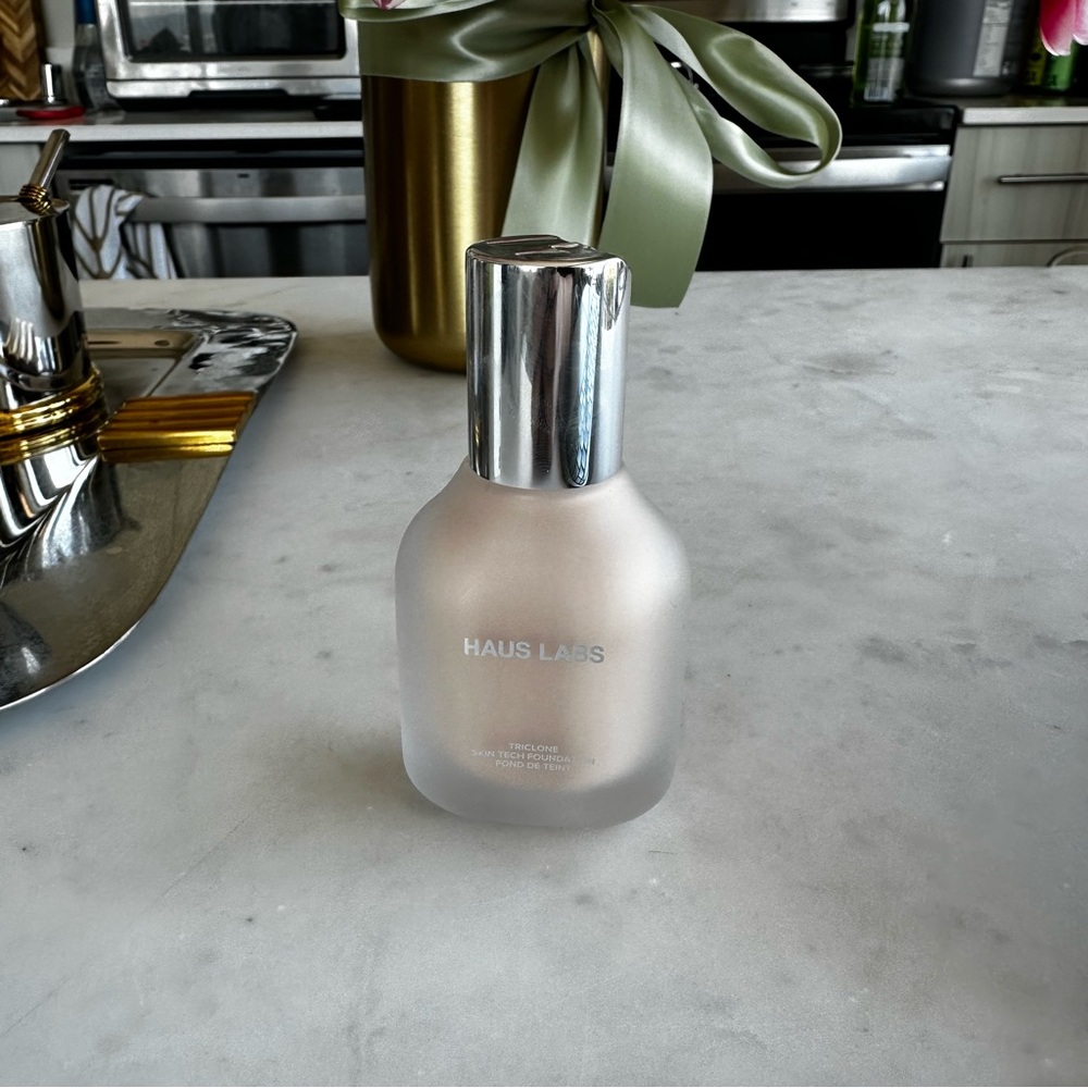 Haus Labs Silver and Frosted Glass Bottle